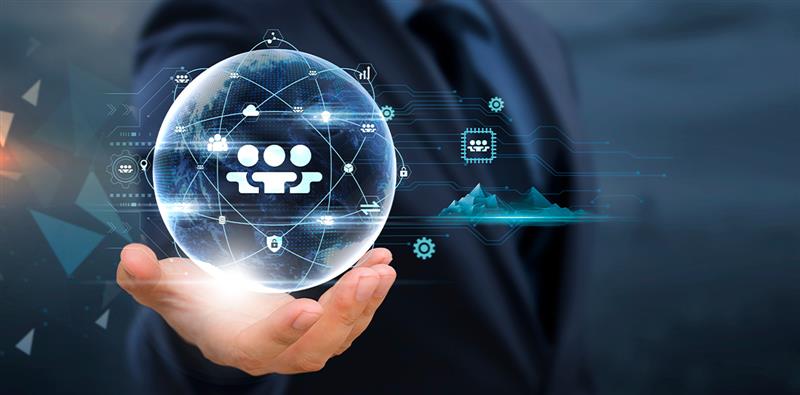 A business professional holding a digital globe with interconnected icons representing partner networks, data analytics, and marketing automation technology.