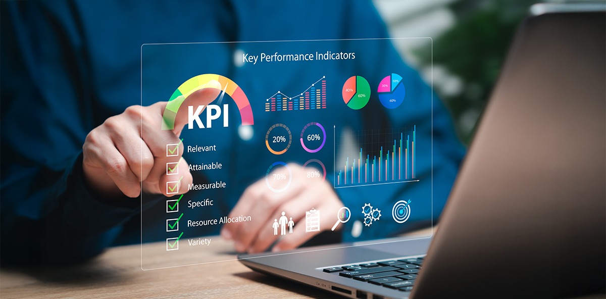 Professional analyzing KPI dashboard to measure success and improve PRM Strategy performance.