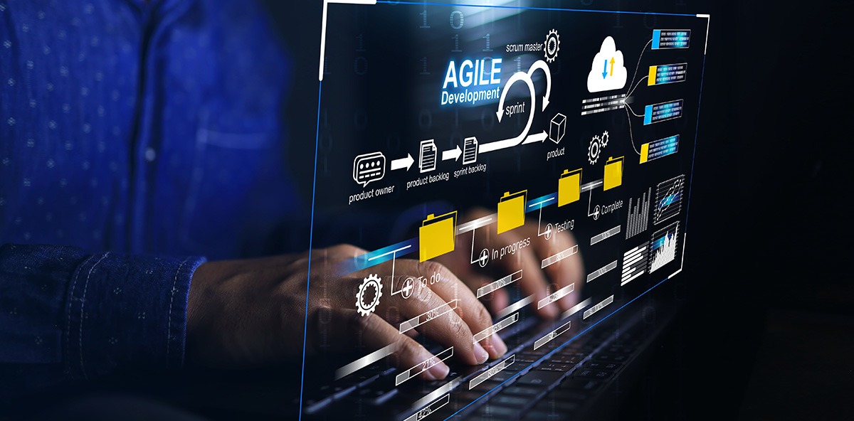 Person typing on a laptop with a digital interface showing Agile development workflow for Channel Partnerships, from planning to deployment.