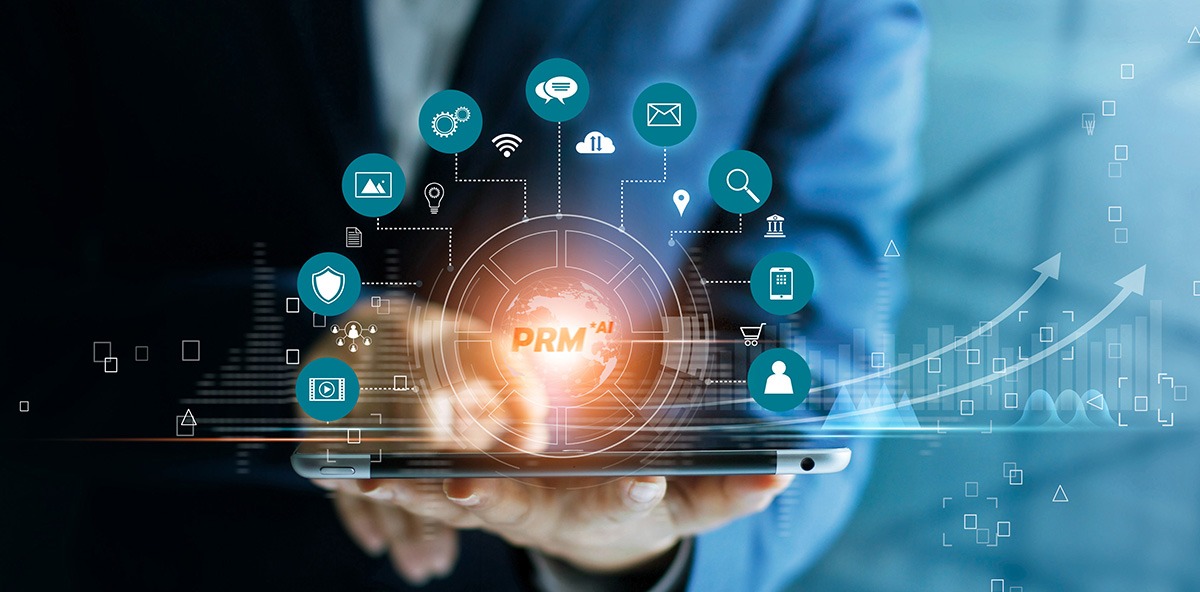 Business professional holding a tablet with digital PRM and AI icons, representing technology-driven growth in Channel Partnerships.