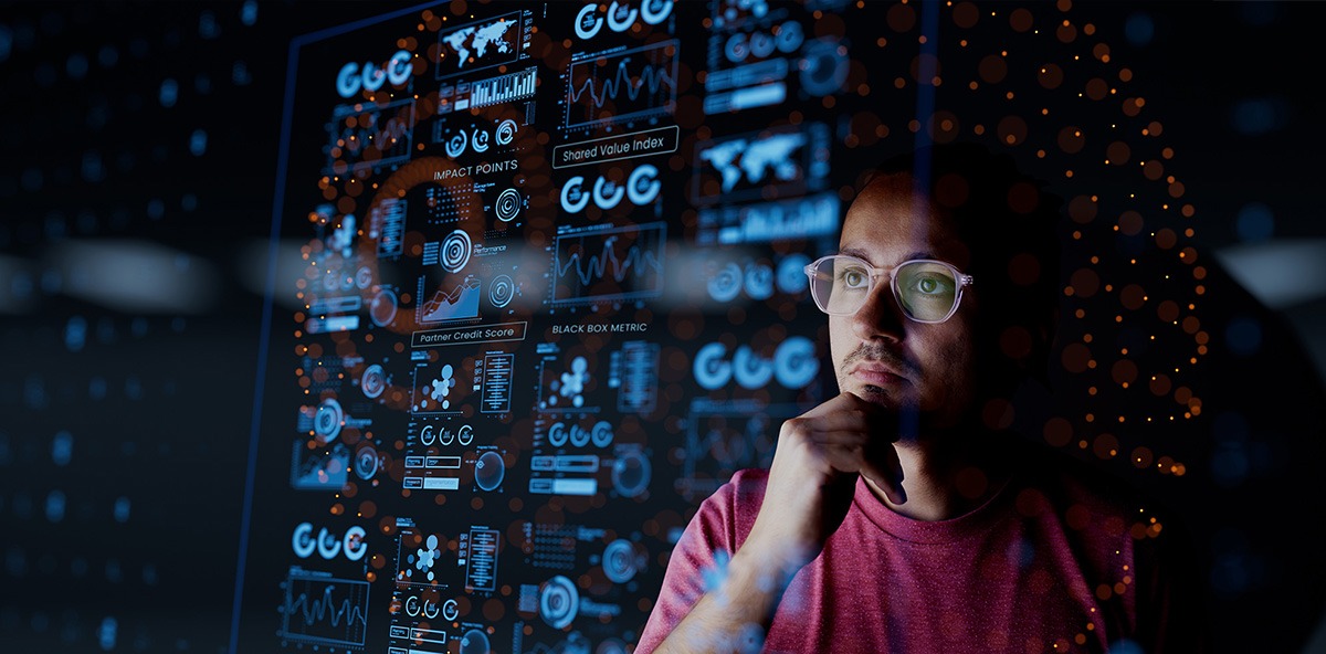 A Person analyzing partner performance data on a futuristic digital dashboard displaying analytics and metrics.